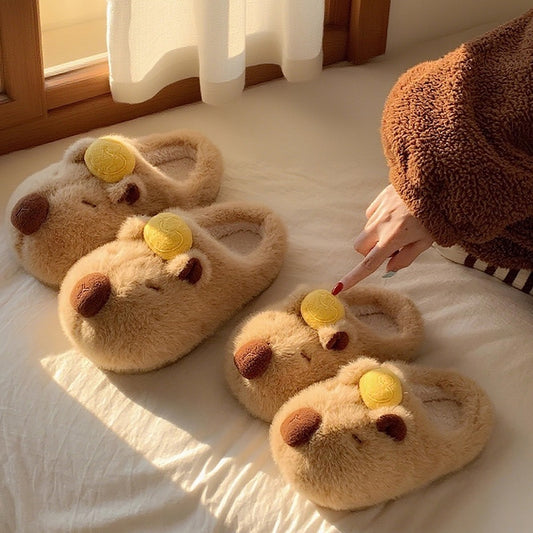 Cute brown capybara plush slippers with gold ingot on head and closed eyes, fuzzy indoor shoes with TPR sole