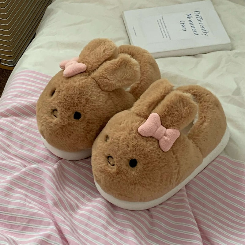 Cute brown bunny plush slippers with pink bow and floppy ears, closed-back fuzzy indoor shoes with EVA sole