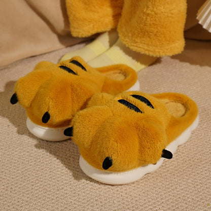 Cute yellow tiger paw plush slippers with black stripes and claws, fuzzy animal paw indoor shoes with EVA sole