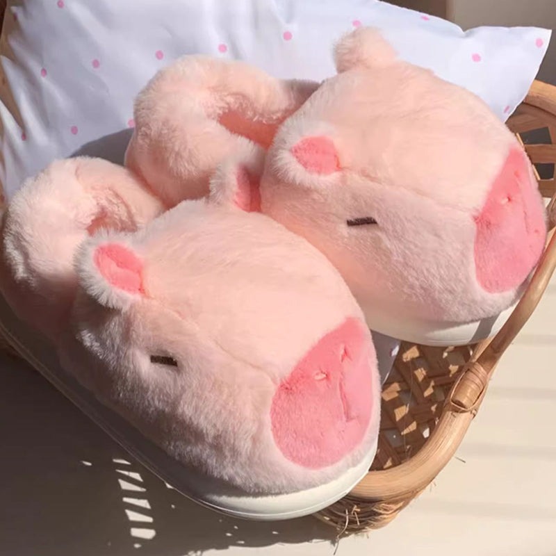 Cute pink capybara plush slippers with large rounded snout and small ears, closed-back fuzzy indoor shoes with EVA sole