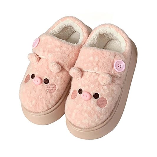 Cute pink pig plush slippers with button accent, pig face with snout and round ears, closed-back fuzzy indoor shoes with EVA sole