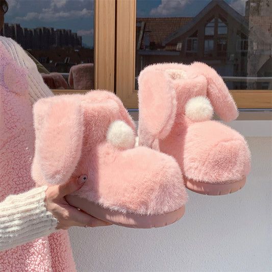 Cute pink bunny bootie slippers with long fuzzy ears and white pom-pom, warm indoor shoes with TPR sole