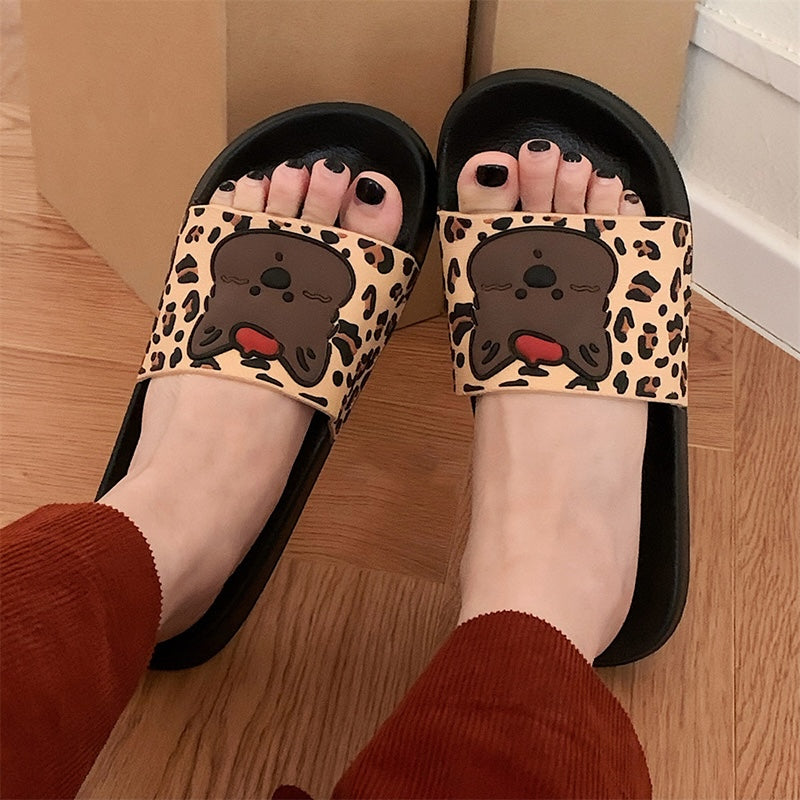 Cute black leopard print dog slippers with brown dog face and red tongue, PVC upper and EVA sole, slip-on indoor shoes