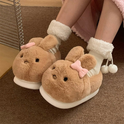 Cute brown bunny plush slippers with pink bow and floppy ears, closed-back fuzzy indoor shoes with EVA sole