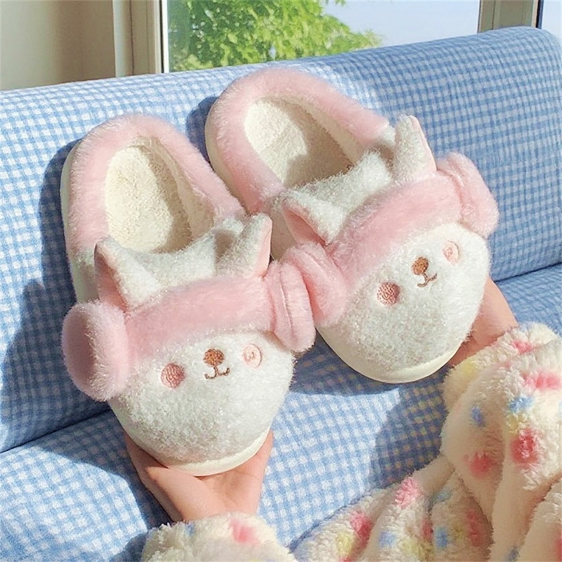 Cute white and pink bunny plush slippers with fuzzy earmuffs and pink blush cheeks, indoor shoes with EVA sole