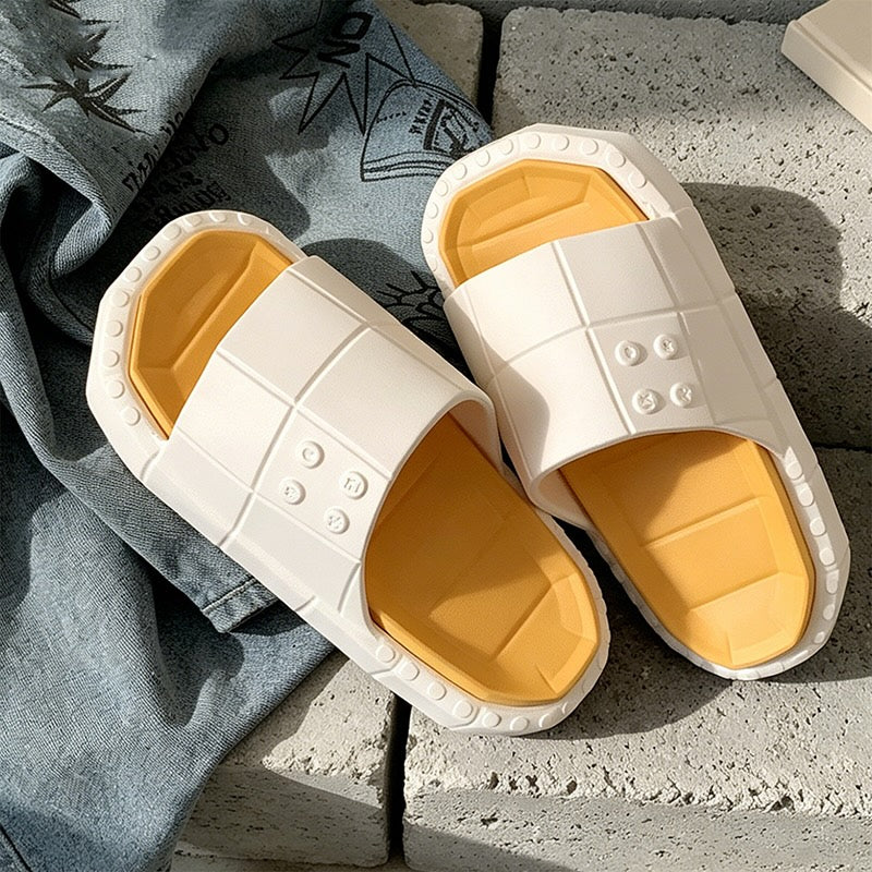 Cute white building block EVA slide sandals with blue footbed and red sole, lightweight color-block indoor shoes