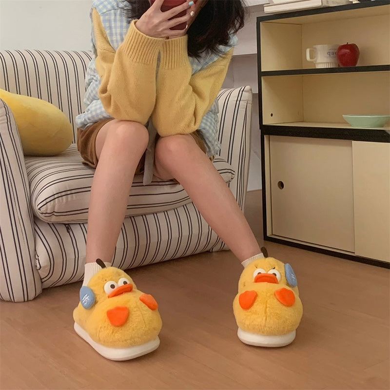Cute yellow duck plush slippers with orange beak and asymmetrical cheek patches, indoor shoes with EVA sole