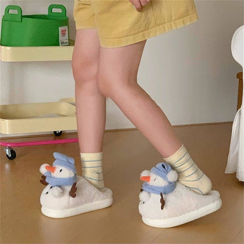Cute white snowman plush slippers with blue knit hat, scarf, and carrot nose, closed-back fuzzy indoor shoes with EVA sole