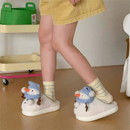 Cute white snowman plush slippers with blue knit hat, scarf, and carrot nose, closed-back fuzzy indoor shoes with EVA sole