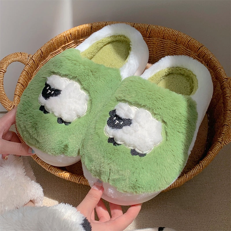 Cute light green sheep plush slippers with white fluffy trim and appliqué sheep design, indoor shoes with EVA sole