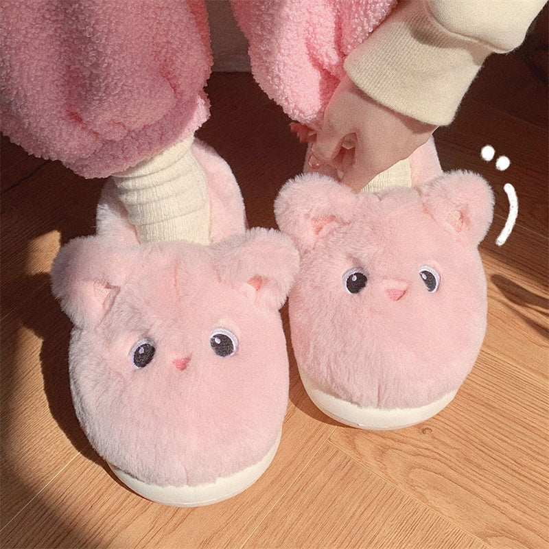 Cute pink animal plush slippers with big round eyes and pink nose, fluffy faux fur indoor shoes with EVA sole