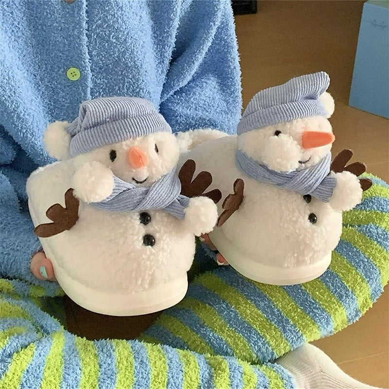 Cute white snowman plush slippers with blue knit hat, scarf, and carrot nose, closed-back fuzzy indoor shoes with EVA sole