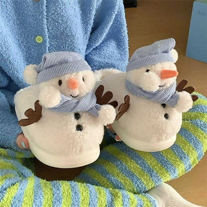 Cute white snowman plush slippers with blue knit hat, scarf, and carrot nose, closed-back fuzzy indoor shoes with EVA sole