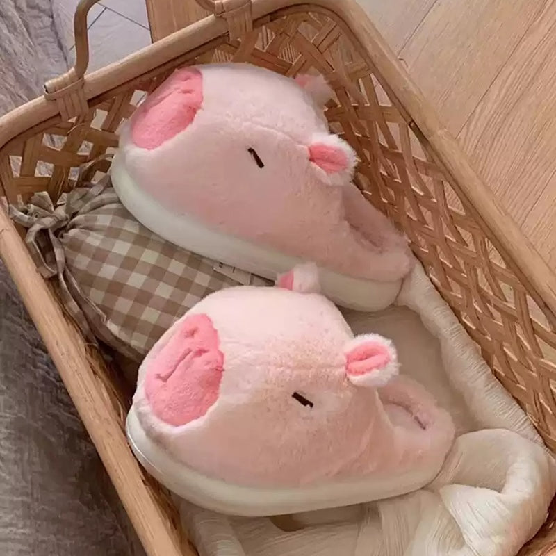 Cute pink capybara plush slippers with simple line eyes and round ears, fuzzy indoor shoes with EVA sole
