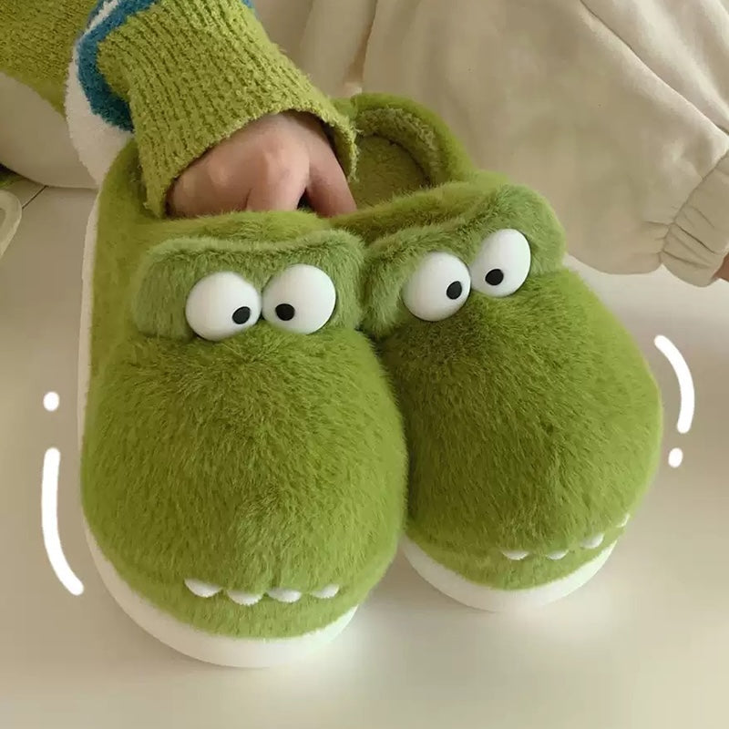 Cute green crocodile plush slippers with big white googly eyes and flat teeth, fuzzy indoor shoes with EVA sole