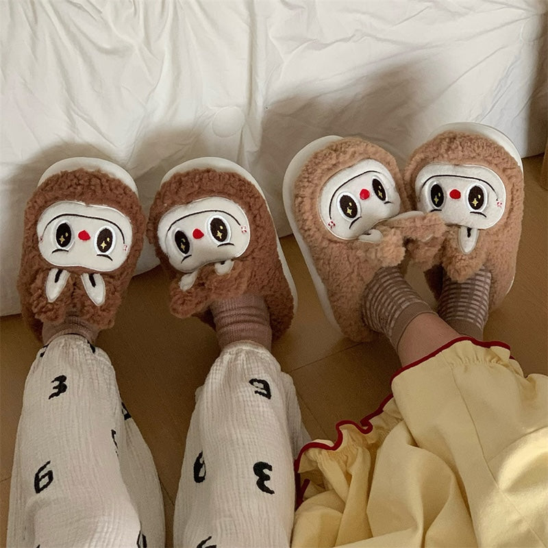 Cute brown fuzzy bunny slippers with white face patch and short ears, indoor shoes with EVA sole