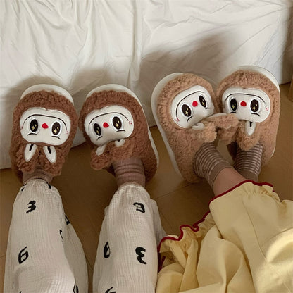 Cute brown fuzzy bunny slippers with white face patch and short ears, indoor shoes with EVA sole