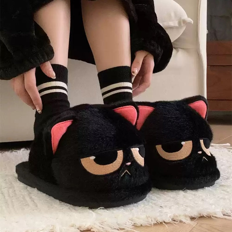 Cute black cat plush slippers with half-closed eyes and pink inner ears, fuzzy indoor shoes