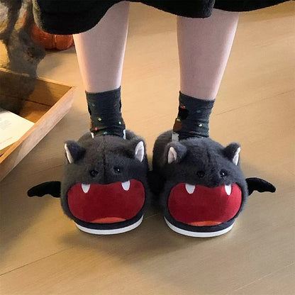 Cute gray Halloween bat plush slippers with red open mouth, white fangs, and bat wings, fuzzy indoor shoes with PVC sole