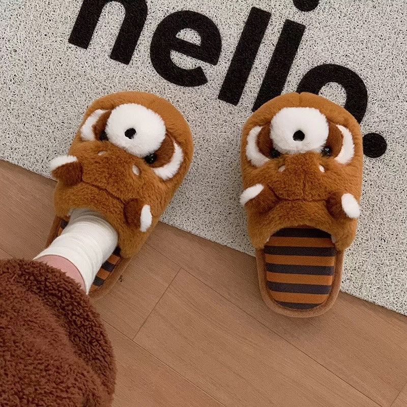 Cute brown raccoon face plush slippers with dark eye masks and white ear tips, warm indoor shoes with PVC sole