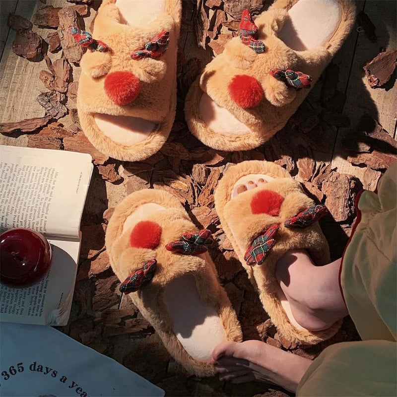 Cute light brown Christmas reindeer plush slippers with plaid ribbon antlers and red nose, fuzzy indoor shoes with PVC sole