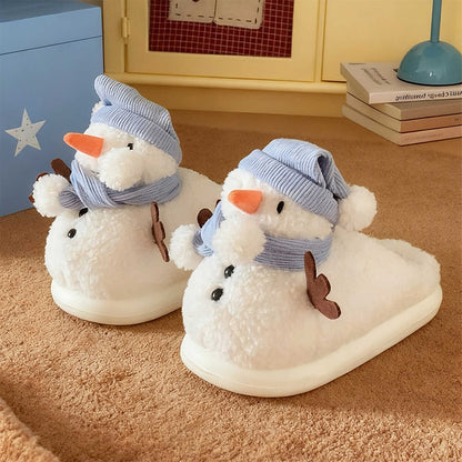 Cute white snowman plush slippers with blue knit hat, scarf, and carrot nose, closed-back fuzzy indoor shoes with EVA sole