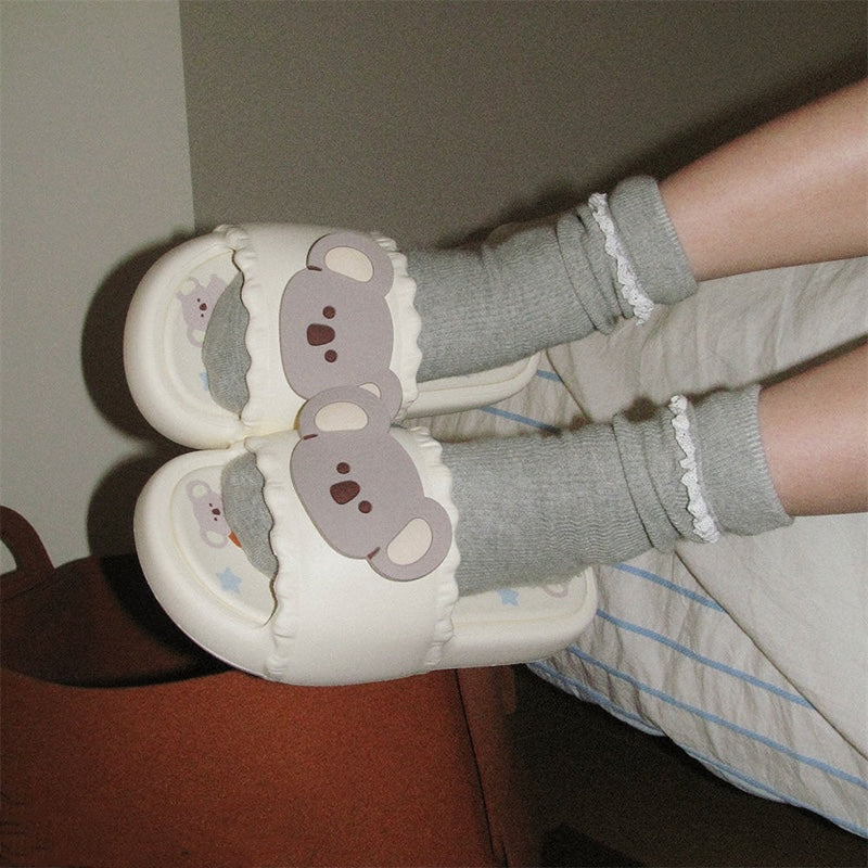 Cute milky white koala print EVA slide sandals with 3D koala face, ruffled trim, and star print footbed, all-EVA indoor slip-on shoes