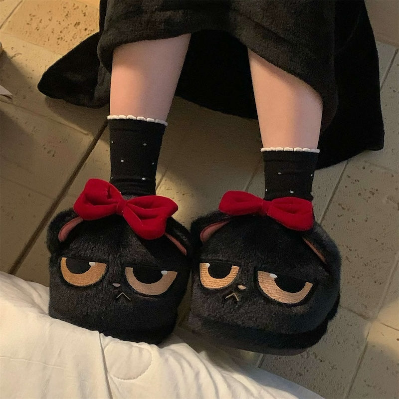 Cute black closed-back cat plush slippers with removable red bow and sleepy eyes, fuzzy indoor shoes with PVC sole