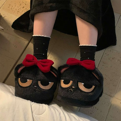 Cute black closed-back cat plush slippers with removable red bow and sleepy eyes, fuzzy indoor shoes with PVC sole