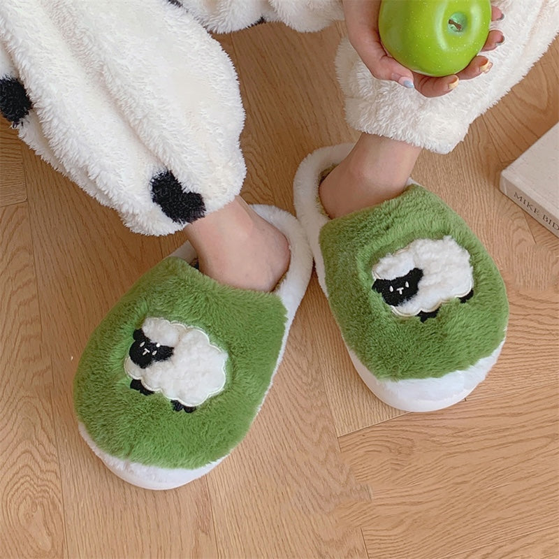 Cute light green sheep plush slippers with white fluffy trim and appliqué sheep design, indoor shoes with EVA sole