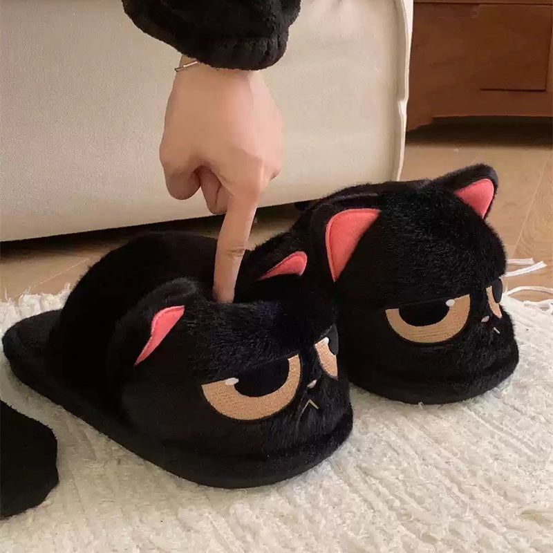 Cute black cat plush slippers with half-closed eyes and pink inner ears, fuzzy indoor shoes