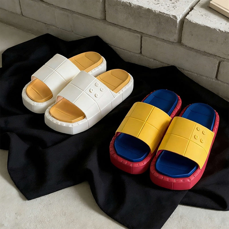 Cute yellow building block EVA slide sandals with blue footbed and red sole, lightweight color-block indoor shoes