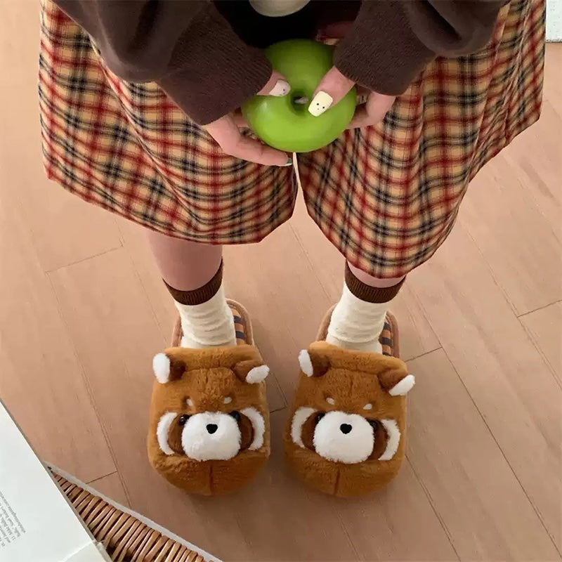 Cute brown raccoon face plush slippers with dark eye masks and white ear tips, warm indoor shoes with PVC sole