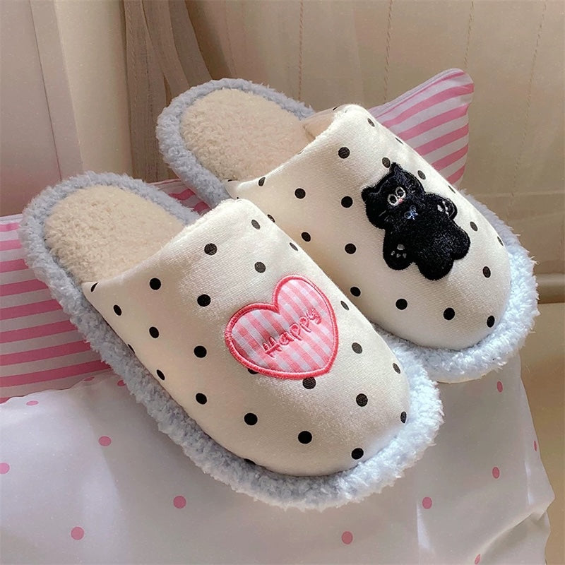 Cute light blue polka dot indoor slippers with pink heart and black cat patch, fuzzy lined fabric shoes with PVC sole