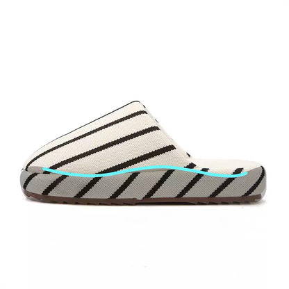 Black and white striped linen slippers with woven texture and dark lining, indoor shoes with TPR sole