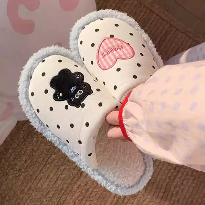 Cute light blue polka dot indoor slippers with pink heart and black cat patch, fuzzy lined fabric shoes with PVC sole