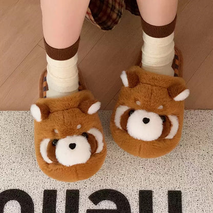 Cute brown raccoon face plush slippers with dark eye masks and white ear tips, warm indoor shoes with PVC sole