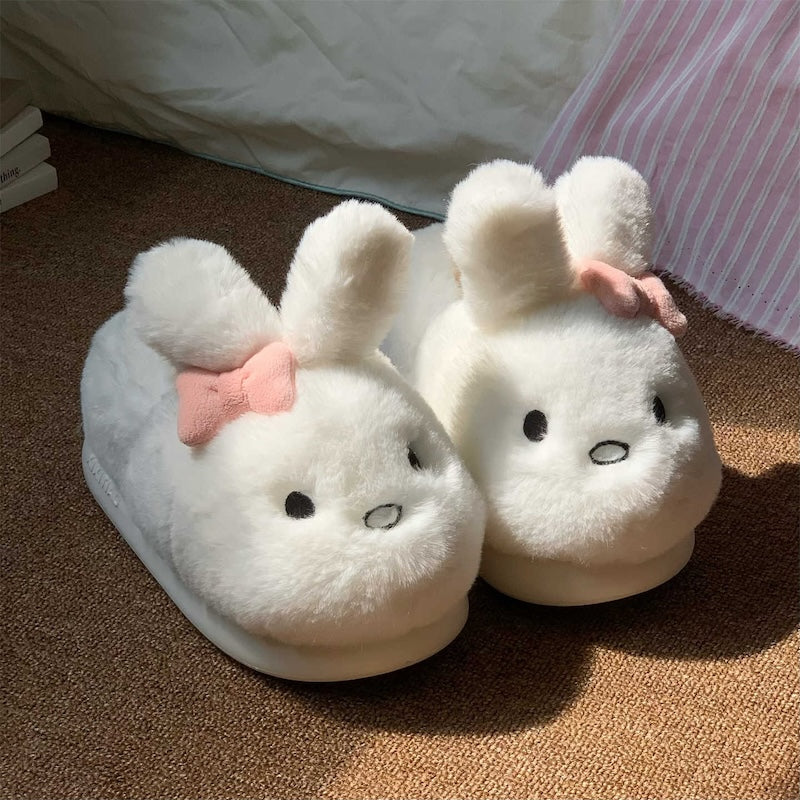 Cute white bunny plush slippers with pink bow and floppy ears, closed-back fuzzy indoor shoes with EVA sole