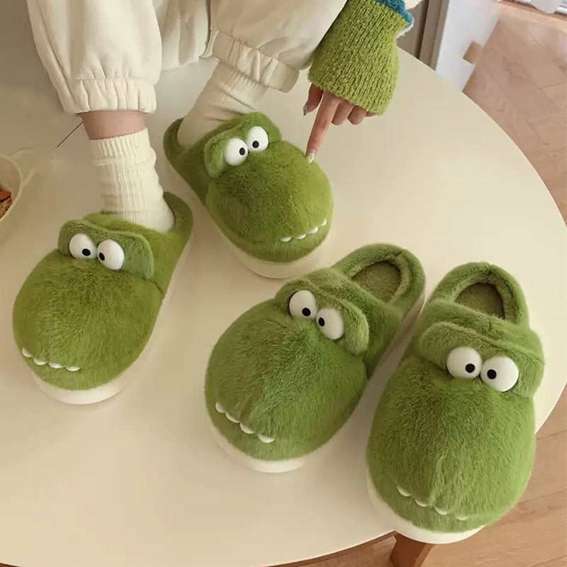 Cute green crocodile plush slippers with big white googly eyes and flat teeth, fuzzy indoor shoes with EVA sole