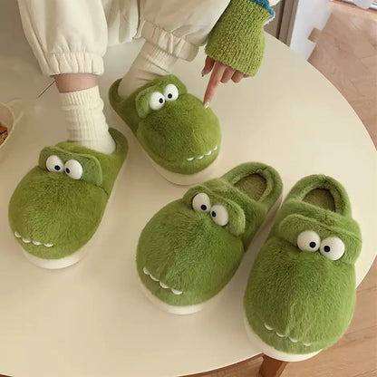 Cute green crocodile plush slippers with big white googly eyes and flat teeth, fuzzy indoor shoes with EVA sole