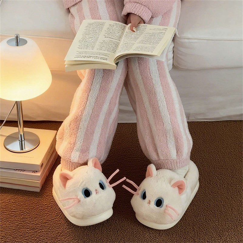 Cute white cat plush slippers with pink ears, blue eyes, and pink whiskers, closed-back fuzzy indoor shoes with EVA sole