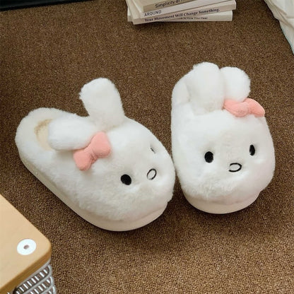 Cute white bunny plush slide slippers with pink bow and floppy ears, fuzzy indoor shoes with EVA sole