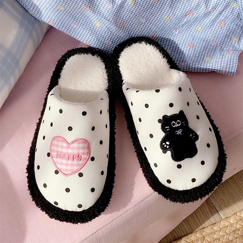 Cute black polka dot indoor slippers with pink heart and black cat patch, fuzzy lined fabric shoes with PVC sole