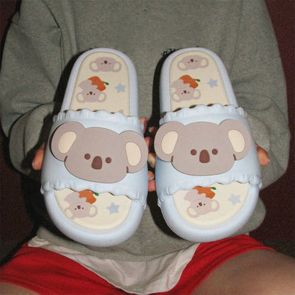 Cute sky blue koala print EVA slide sandals with 3D koala face, ruffled trim, and star print footbed, all-EVA indoor slip-on shoes