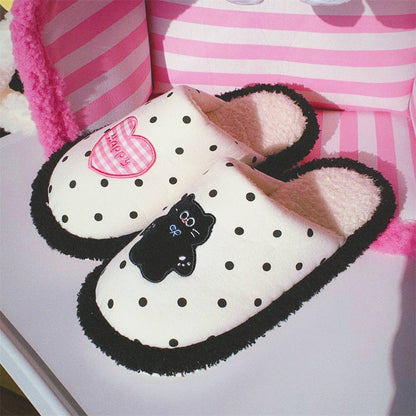 Cute black polka dot indoor slippers with pink heart and black cat patch, fuzzy lined fabric shoes with PVC sole