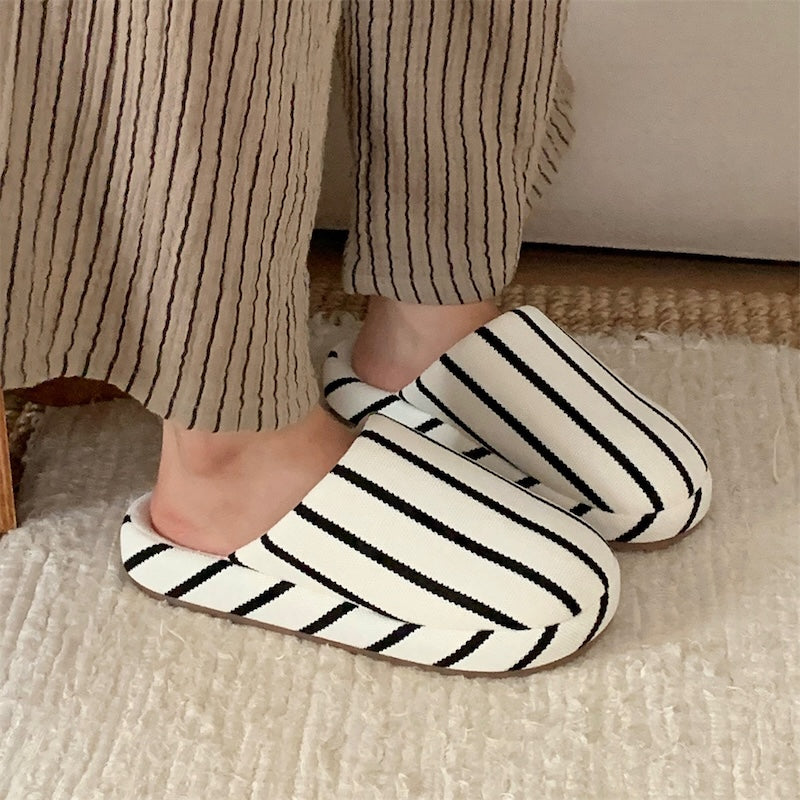 Black and white striped linen slippers with woven texture and dark lining, indoor shoes with TPR sole