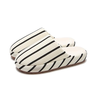 Black and white striped linen slippers with woven texture and dark lining, indoor shoes with TPR sole