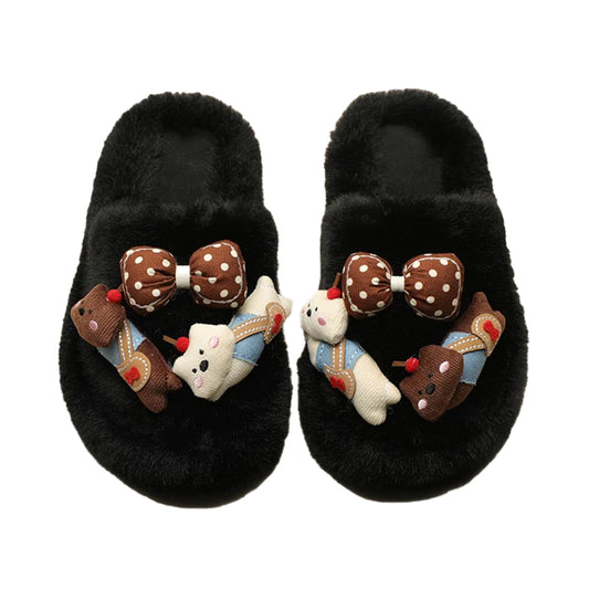 Black plush slippers decorated with a 3D bear wearing blue suspenders and a brown polka-dot bow, soft rubber sole indoor footwear