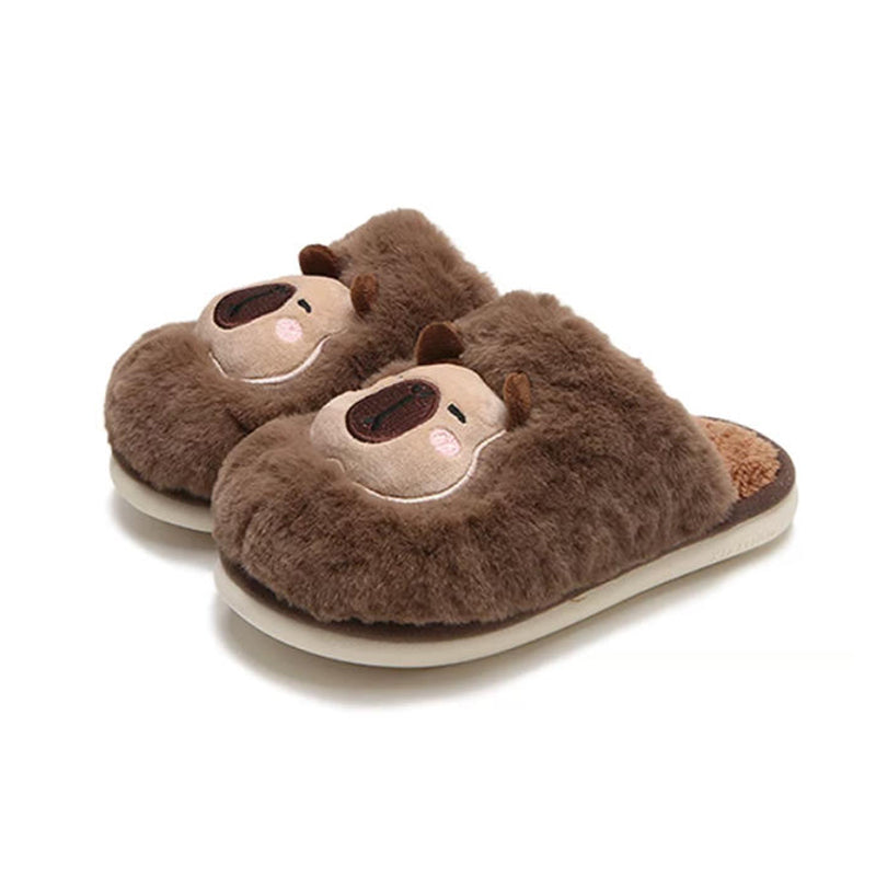 Brown fuzzy slippers featuring an embroidered capybara character with pink cheek accents, comfortable home shoes with PVC outsole