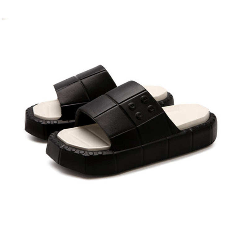 Cute black building block EVA slide sandals with blue footbed and red sole, lightweight color-block indoor shoes